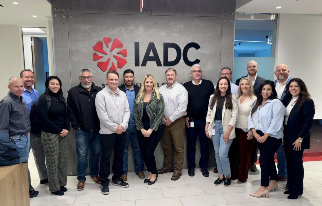 Jackie (front row, fourth from far right) is pictured with members of the IADC HSE&T Committee following a meeting at IADC’s Houston office this year.